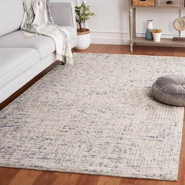 Abstract Light Blue/Ivory 6 ft. x 9 ft. Checkered Unitone Area Rug