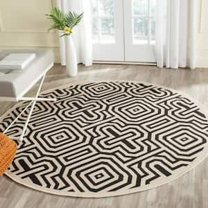 Courtyard Sand/Black 7 ft. x 7 ft. Round Border Indoor/Outdoor Patio  Area Rug