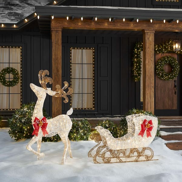 5 ft. Polar Wishes LED Reindeer with Sleigh Y11