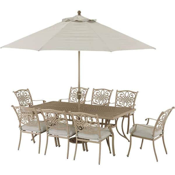 Hanover Traditions 9-Piece Metal Outdoor Dining Set in sand with CushionsU mbrella and Stand