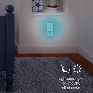 0.5-Watt Color-Changing Plug In Light Sensing Integrated LED Night Light