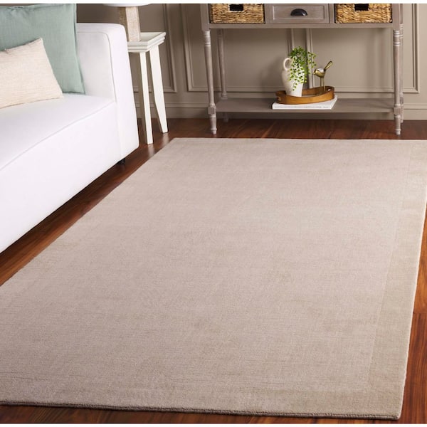 Mirage 6 ft. x 9 ft. Ivory Solid Color Border Area Rug