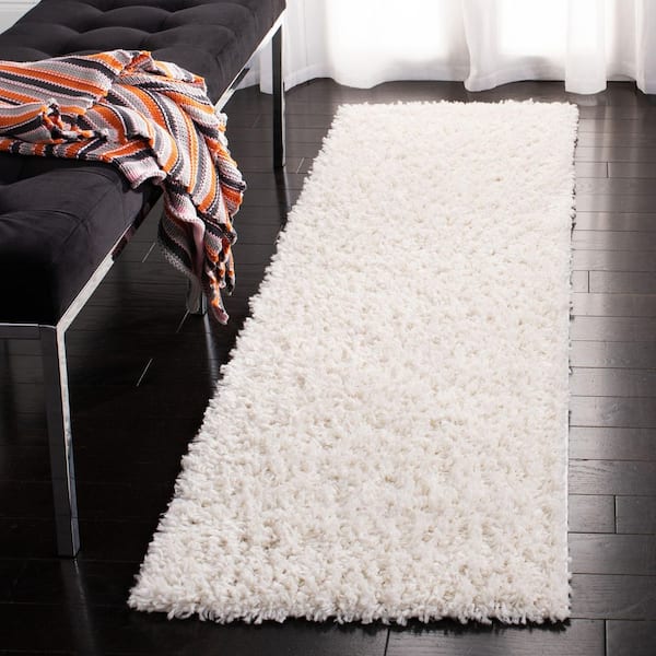 August Shag Ivory 2 ft. x 9 ft. Solid Runner Rug