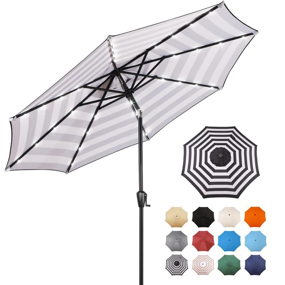 Sun-Ray 9 FT 32 LED Patio Solar Umbrella w/ Push Button Tilt and Crank Outdoor Umbrella  8 Sturdy Ribs  UV Protection  Solution-Dyed Fabric  Creamy Beige