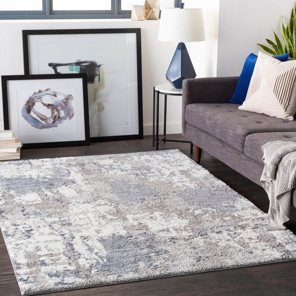Blue and Beige Abstract 9' x 12' Synthetic Area Rug