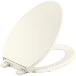 Border Elongated Closed Front Toilet Seat in Biscuit