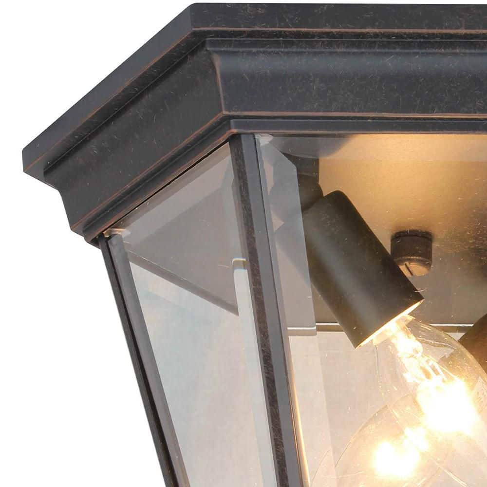 11-inch Rubbed Bronze and Clear Glass Globe Ceiling Lantern