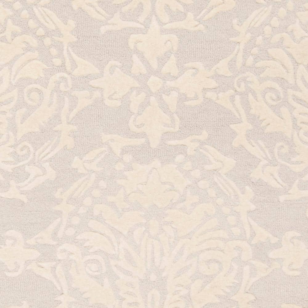 Light Grey and Ivory Floral Wool Tufted Area Rug 5' x 8'
