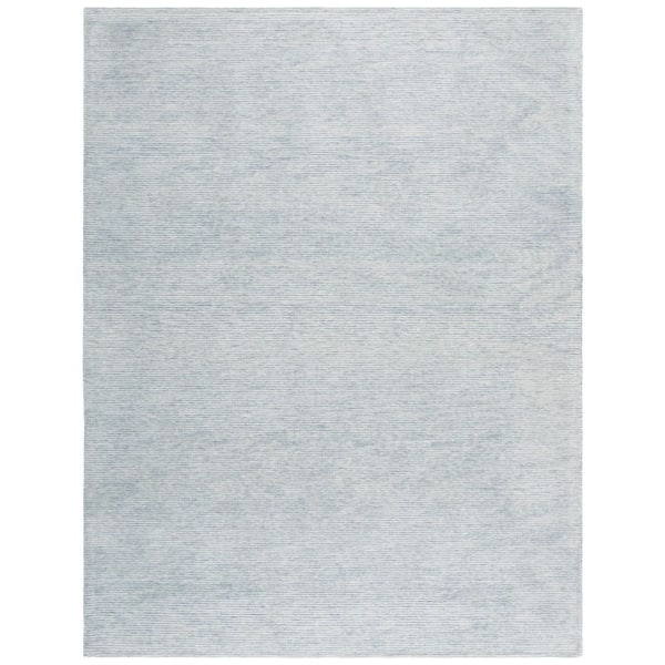 Ebony 6 ft. x 9 ft. Turquoise/Ivory Solid Color Area Rug