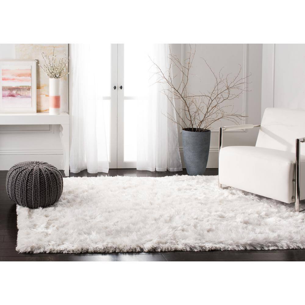 Ivory Hand-Tufted Shag Synthetic 9' x 12' Area Rug