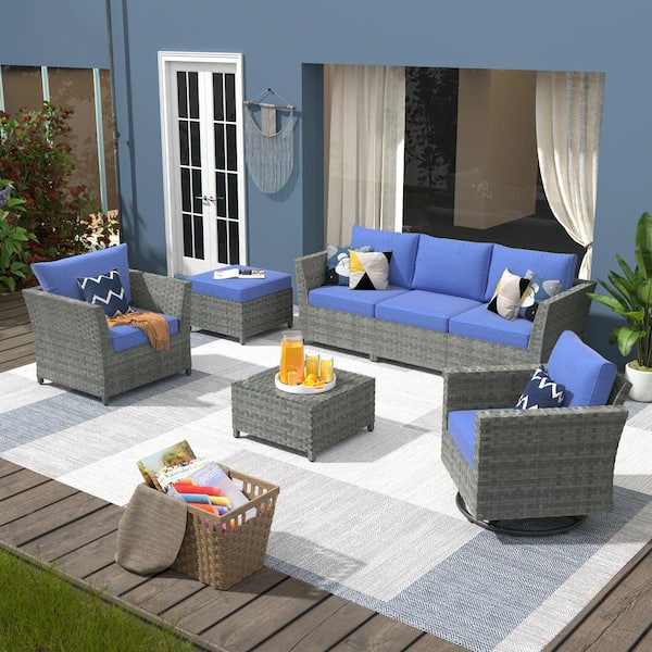 XIZZI Fontainebleau Gray 7-Piece Wicker Patio Conversation Sectional Sofa Set with Navy Blue Cushions and Swivel Rocking Chair