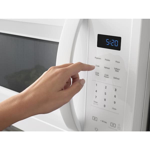 https://images.thdstatic.com/productImages/d51d4fa6-d485-42ef-b8ee-181709edfb9f/svn/white-whirlpool-over-the-range-microwaves-wmh31017hw-44_600.jpg