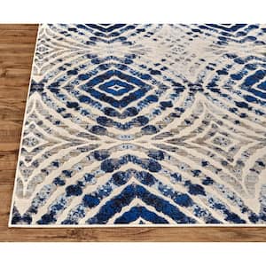 9' Round Ivory and Blue Abstract Area Rug