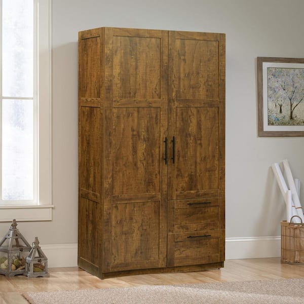 https://images.thdstatic.com/productImages/d5297e26-3d01-4bcc-bbce-b8b1103417a9/svn/walnut-armoires-wardrobes-1cuu0069-31_600.jpg