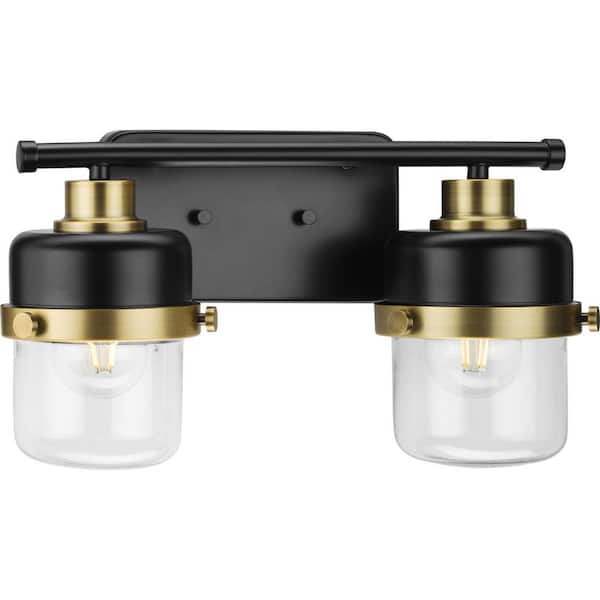 Progress Lighting Beckner Collection 14.62 in. 2-Light Matte Black Clear Glass Urban Industrial Vanity Light with Vintage Brass Accents