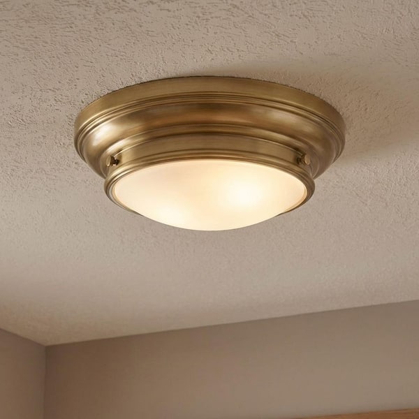 13 in. W x 4.50 in. H 2-Light Natural Brass Flush Mount Light with White Glass Round Shade