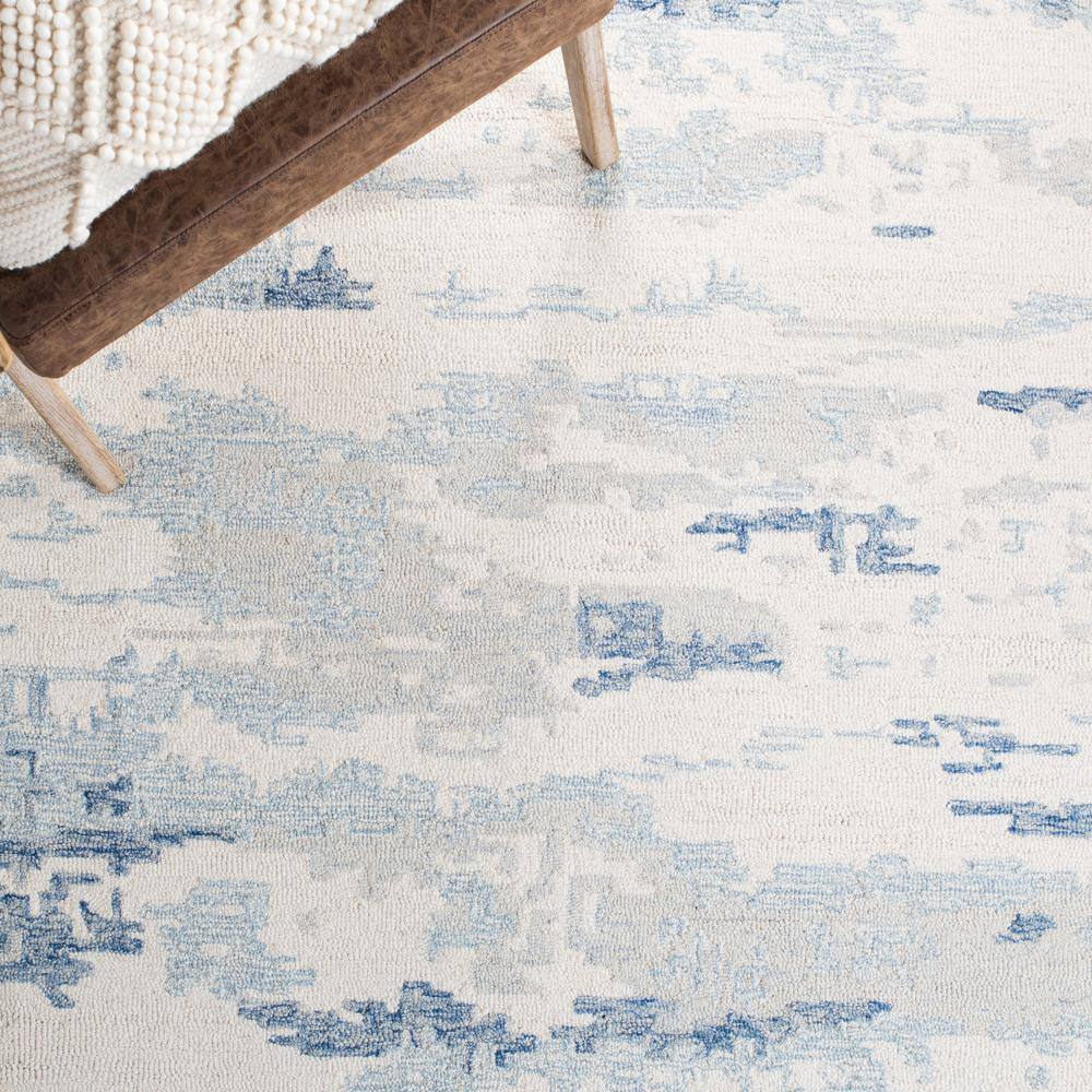 Ivory and Blue Round Hand-Tufted Wool Abstract Rug