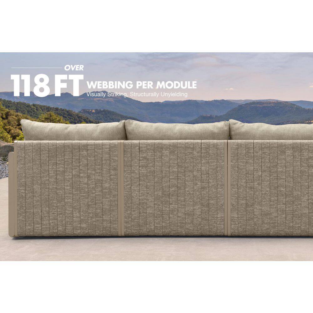 Rear view of the modular beige outdoor sofa showing the webbing construction.