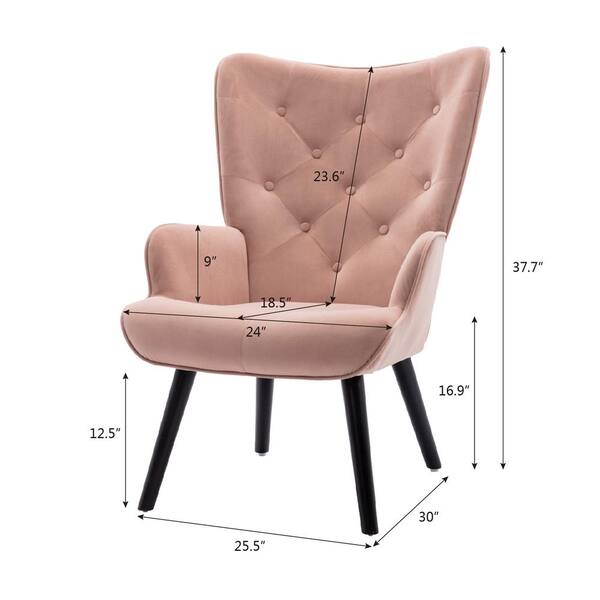 pink velvet chair with wooden legs