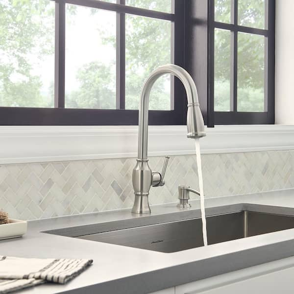 https://images.thdstatic.com/productImages/d54ce084-46fc-4301-90ae-392eebeaaa9a/svn/stainless-steel-american-standard-pull-down-kitchen-faucets-7029301-075-66_600.jpg