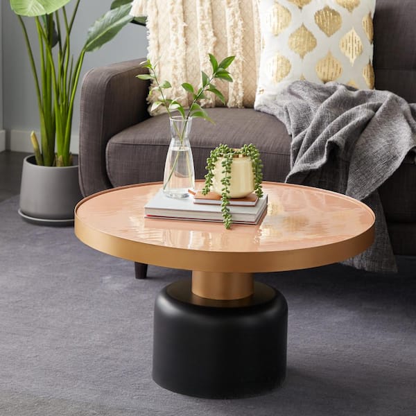Litton Lane 30 in. x 18 in. Round Gold and Black Metal Coffee Table with Dark Peach Enamel Inlay