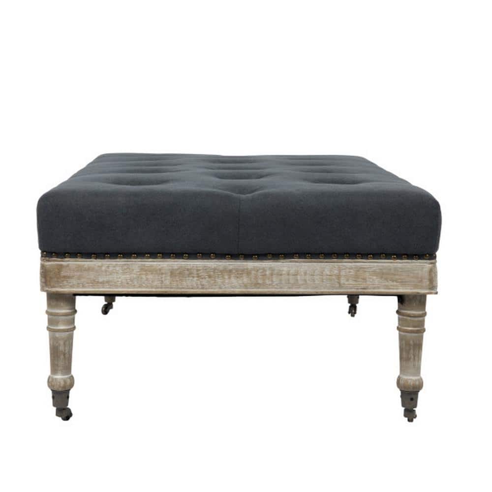 Antoinette Gray Tufted Upholstered Coffee Table with Distressed Wood Legs