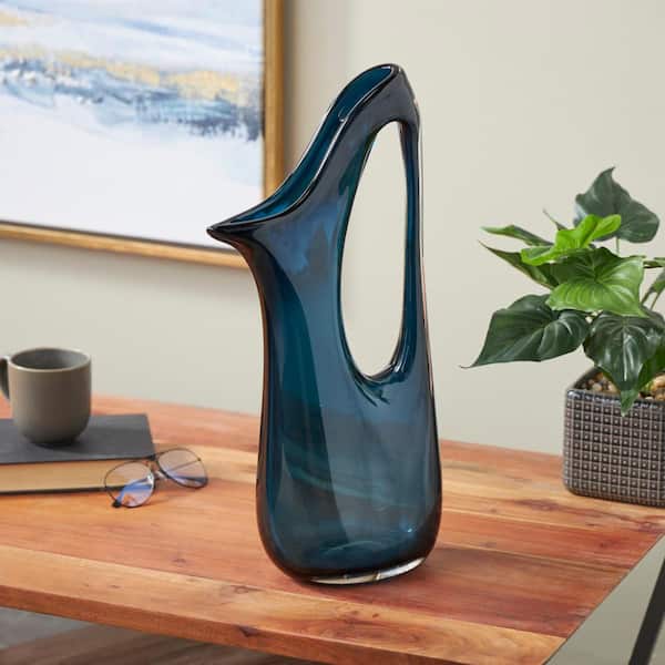 Litton Lane Blue Glass Abstract Decorative Vase with Cutout Handle and Elongated Opening