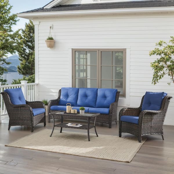 4-Piece Brown Wicker Patio Conversation Set with Olefin Blue Cushions and Lounge Chairs/Sofa