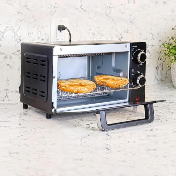 https://images.thdstatic.com/productImages/d586d9f0-8afa-44f7-afe9-2e7f87c4b0b5/svn/black-total-chef-toaster-ovens-tcto09-c3_600.jpg