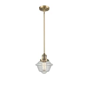 Oxford 1-Light Brushed Brass Schoolhouse Pendant Light with Seedy Glass Shade