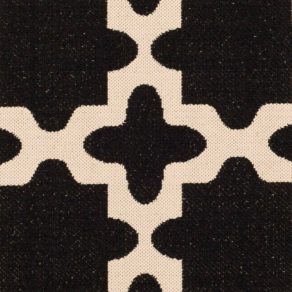 Courtyard Reversible 47" Round Black & Beige Synthetic Area Rug