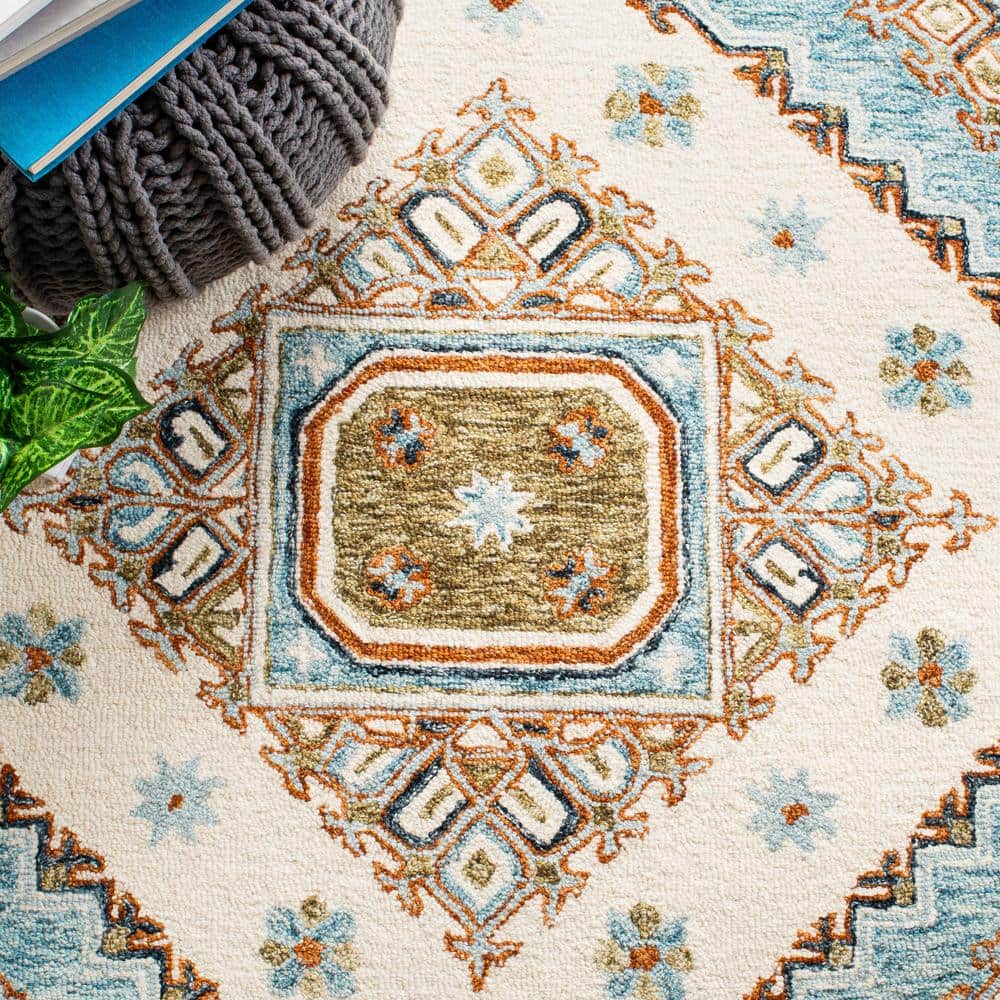 Ivory and Rust Medallion Wool 8' x 10' Handmade Tufted Rug