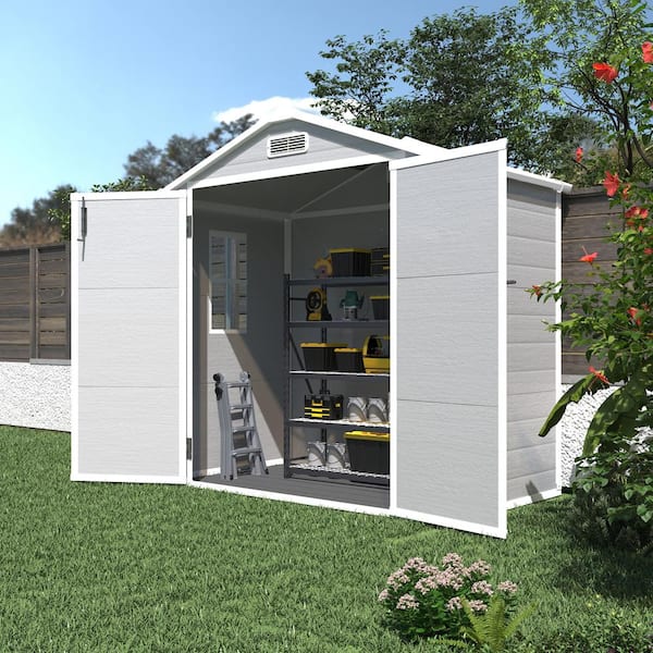 Cesicia 6 ft. W x 4.4 ft. D Resin Weather Resistant Outdoor Storage Plastic Shed with Floor and Lockable Doors (26 sq. ft.)