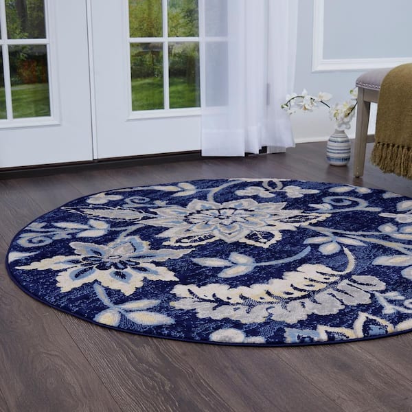 https://images.thdstatic.com/productImages/d5efa1c9-2662-4552-b0d2-265f4bc841aa/svn/navy-blue-grey-home-dynamix-area-rugs-6r-hd5019-300-e1_600.jpg