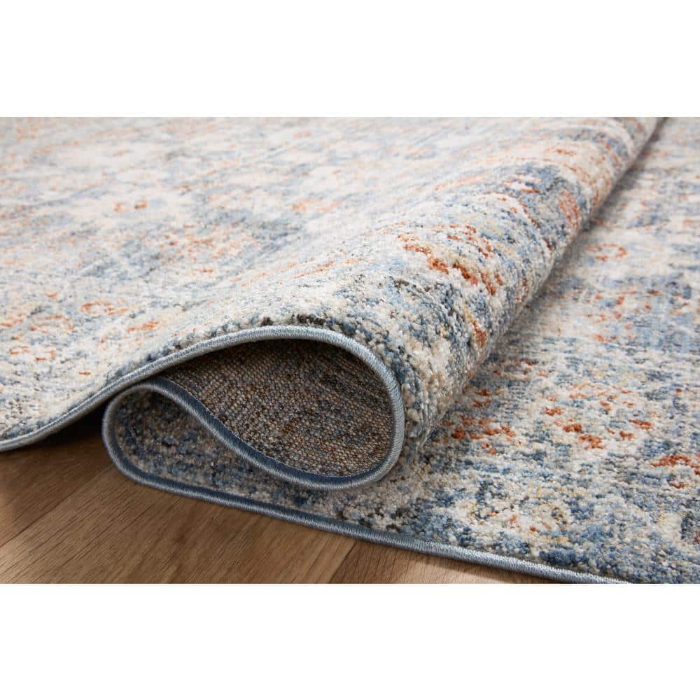 Odette Sky and Rust Synthetic Stain-Resistant Area Rug 5'-3" x 7'-9"