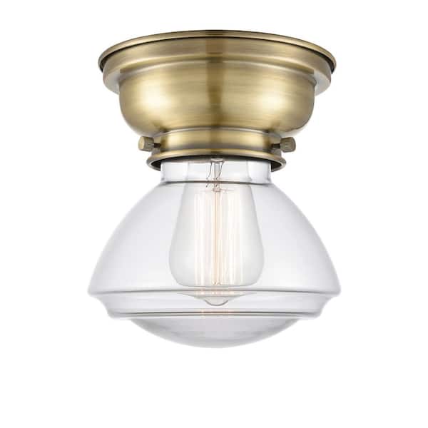 Olean 6.75 in. 1-Light Antique Brass Industrial Flush Mount with Clear Glass Shade