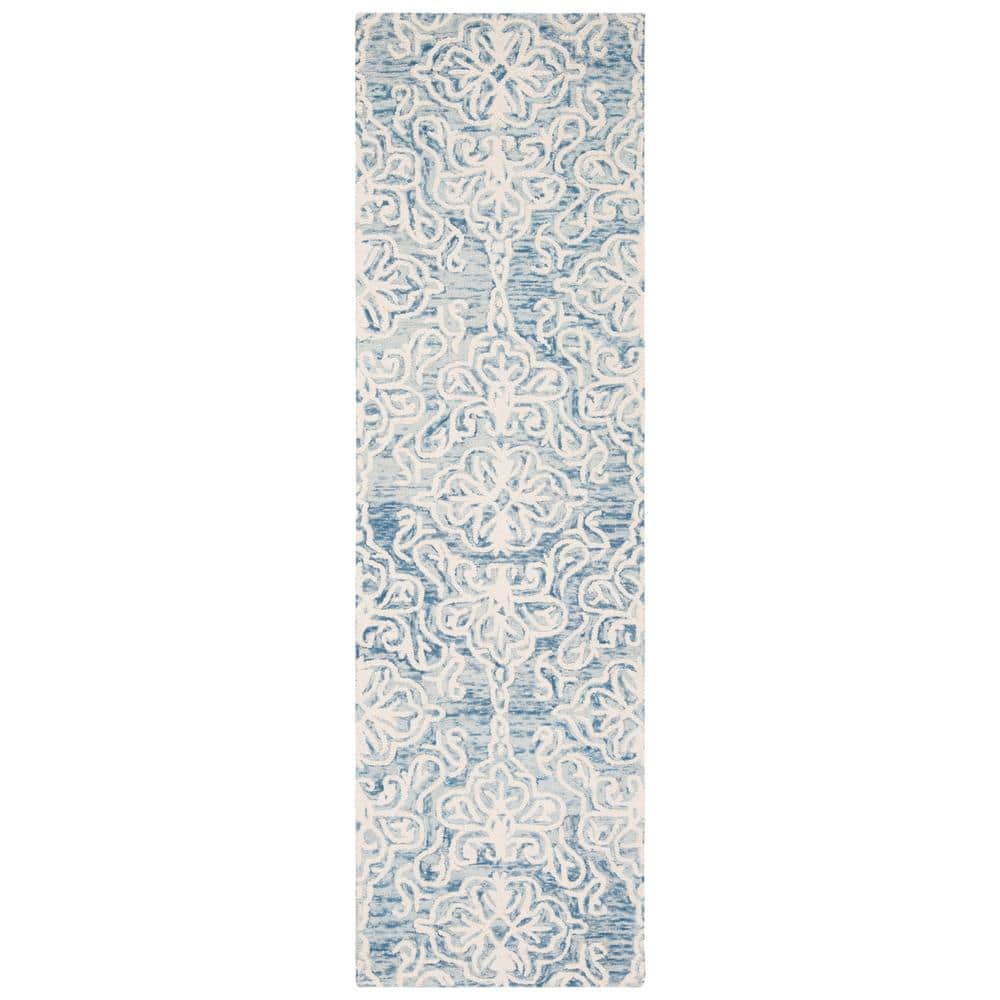 Handmade Tufted Blue/Ivory Floral Wool Area Rug