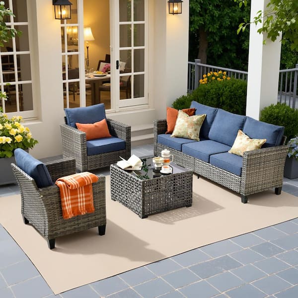 Scarlet 4-Piece Wicker Outdoor Furniture Patio Conversation Sofa Set with a Solar Lighted Table and Denim Blue Cushions