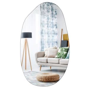 19.7 in. W x 33.5 in. H Asymmetrical Oval Accent Wall Mounted Frameless Mirror