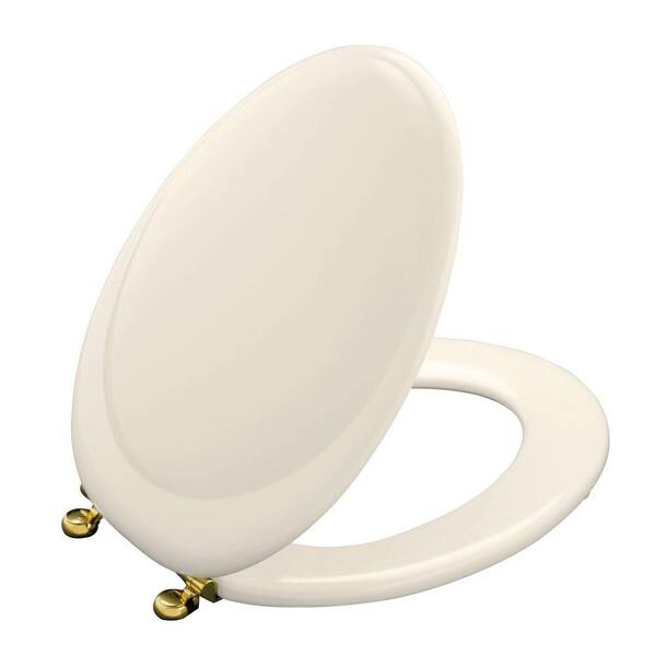 KOHLER Revival Elongated Closed-Front Toilet Seat with Polished Brass hinges-DISCONTINUED