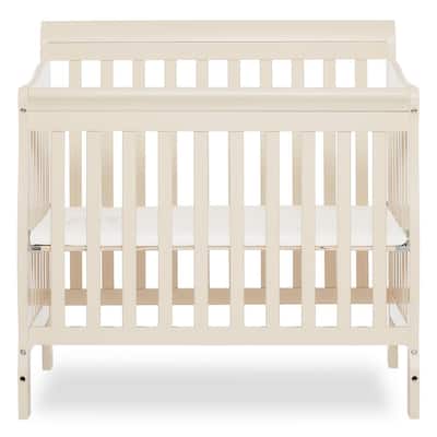 beige cribs