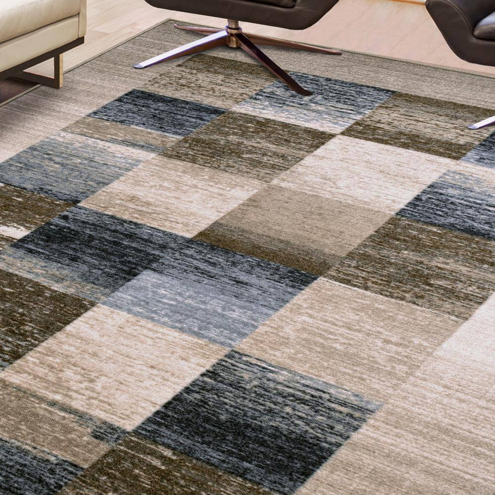 Cream 9' x 12' Non-Slip Synthetic Area Rug