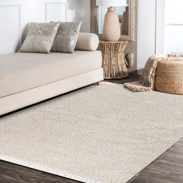 JONATHAN Y Mercer Shag Plush Tassel Cream 8 ft. x 10 ft. Area Rug