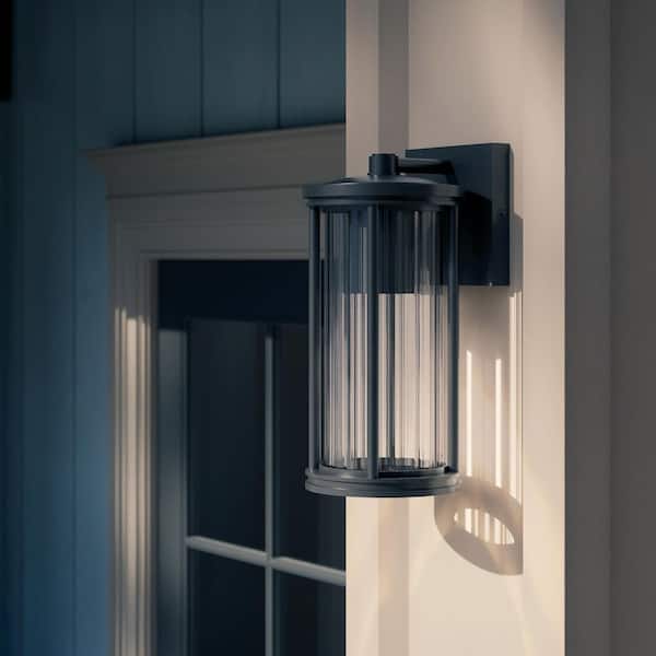 Barras 11.5 in. 1-Light Outdoor DarkSky Approved Wall Sconce with Clear Ribbed Glass in Black