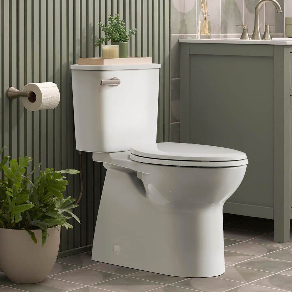 American Standard Aspirations 12 in. Rough In 2-Piece 1.28 GPF Single Flush Elongated Toilet with Slow Close Seat in White