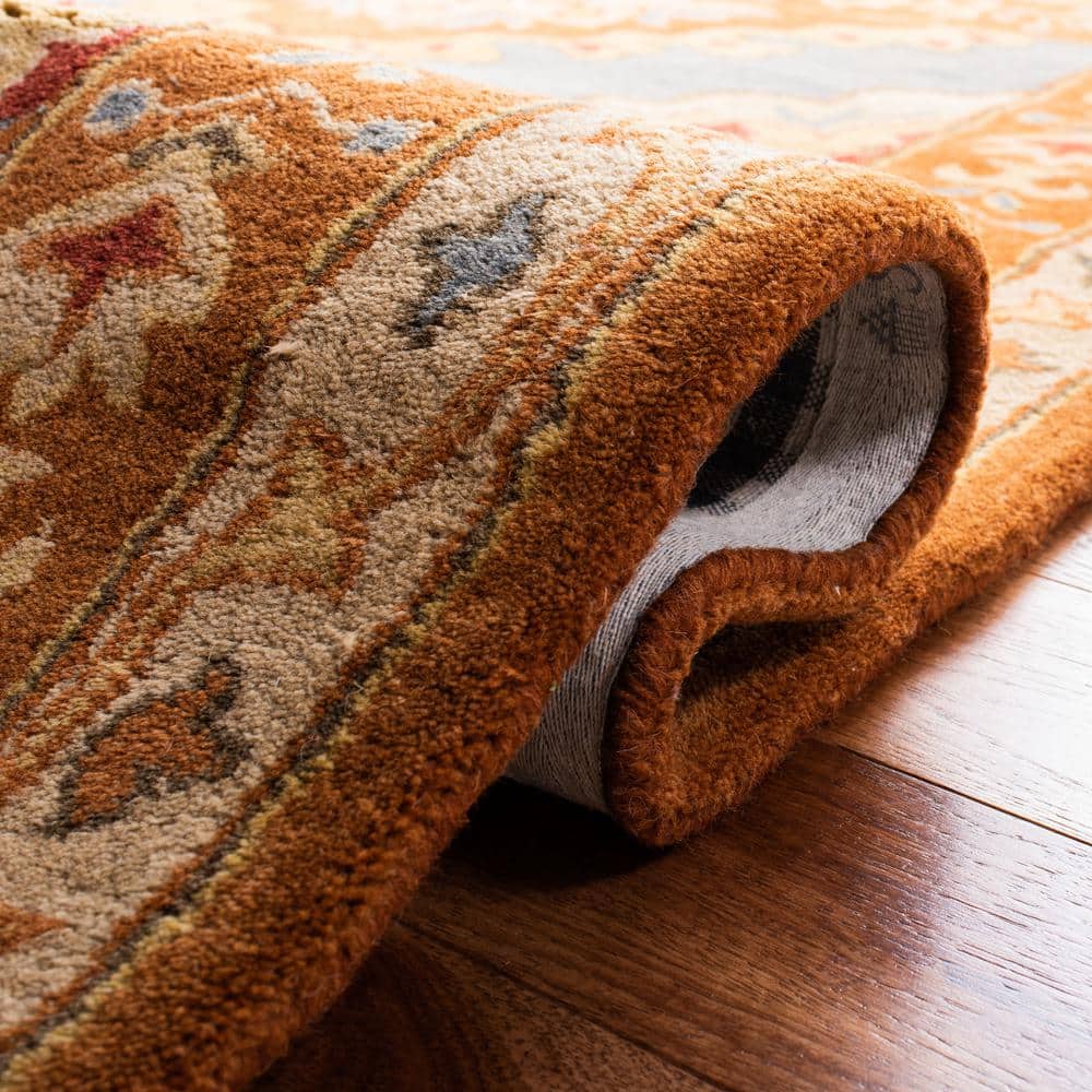 Blue and Rust Hand-Tufted Wool 9' x 12' Area Rug