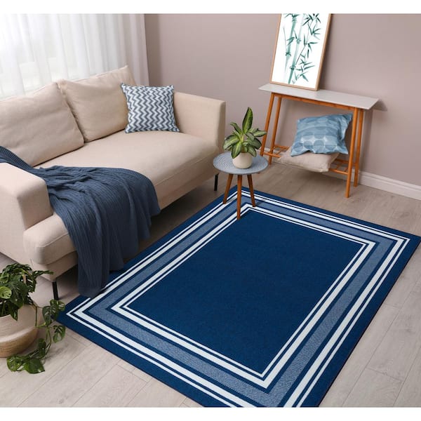 https://images.thdstatic.com/productImages/d6b818cf-59d0-46c1-b52d-5207a2b82041/svn/navy-beverly-rug-area-rugs-hd-crm30766-3x5-44_600.jpg