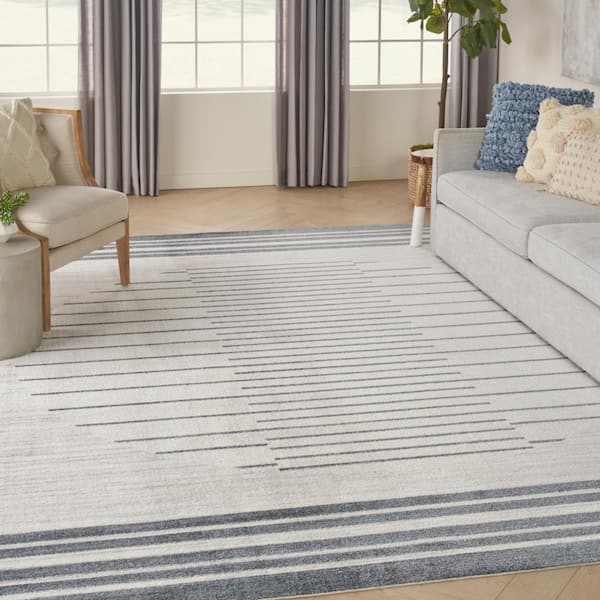 Astra Machine Washable Ivory Blue 9 ft. x 12 ft. Striated Contemporary Area Rug