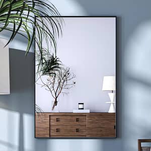 24 in. W x 36 in. H Black Rectangle Framed Tempered Glass Wall-mounted Mirror