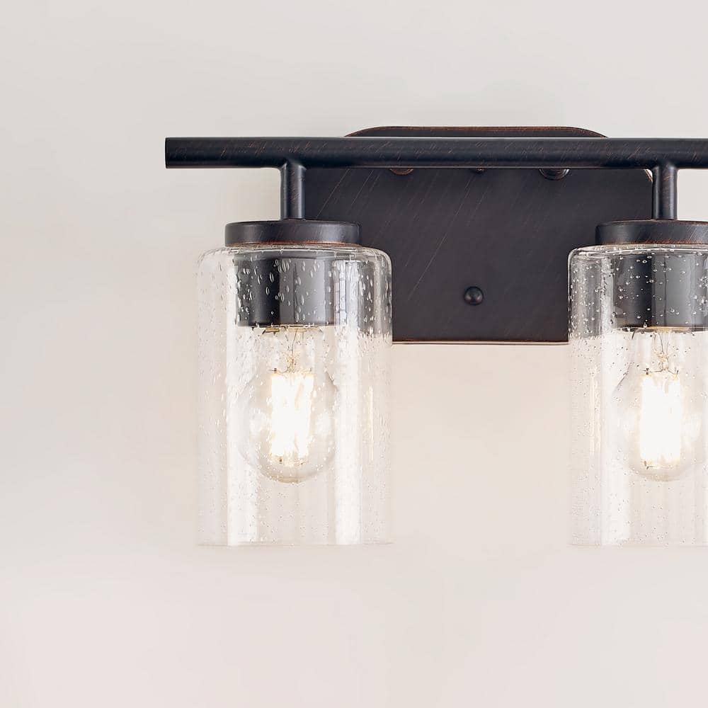 Oslo Bronze 2-Light Vanity Fixture with Clear Seeded Glass